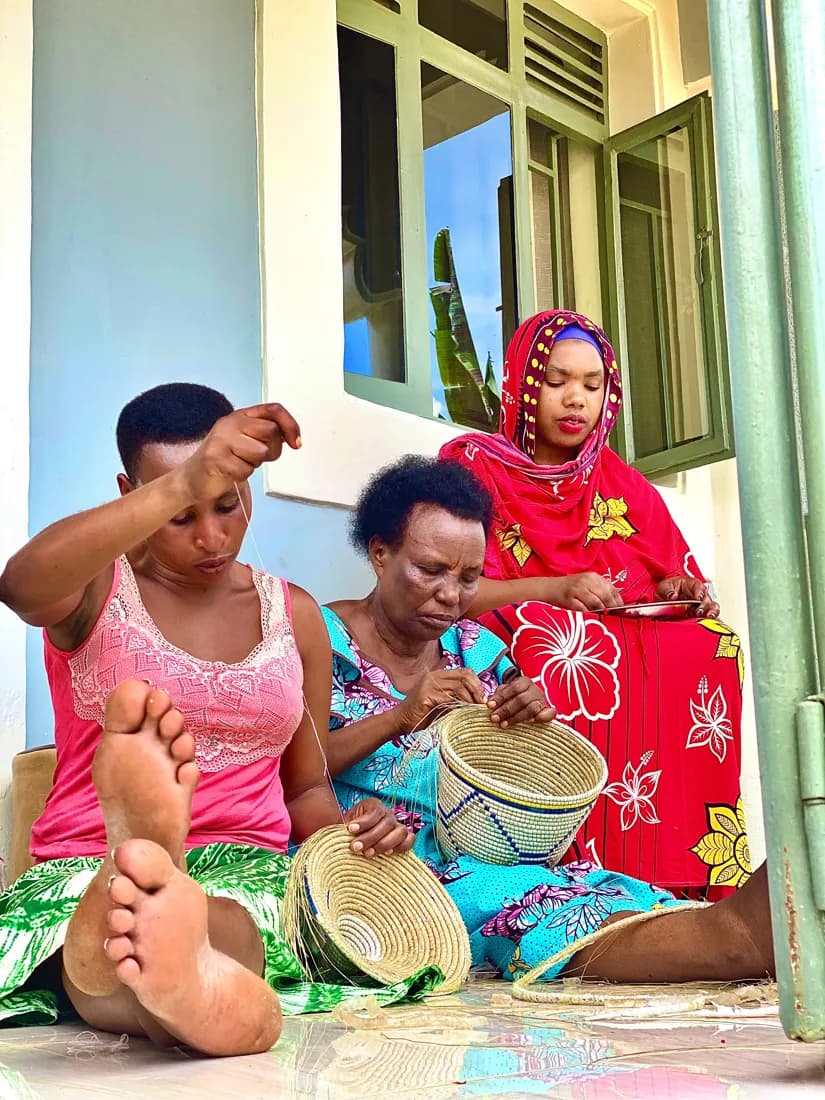 Rwandan women practising traditional basket weaving